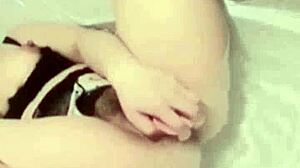 asian girl masturbates in bathroom with toy