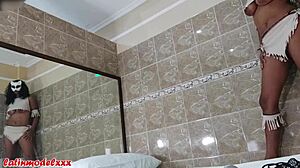 Big tits model teases in tiny costume for photoshoot