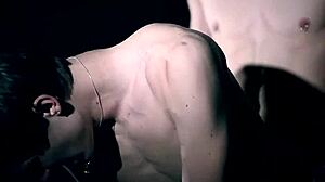 vamp twinks intensely interacting in a dark room