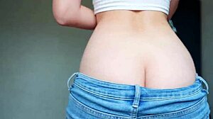 Teen's big ass peeks out during house cleaning