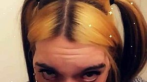 Pretty tranny on her knees, eager to suck you off with toys.