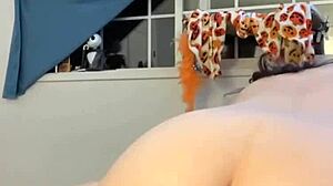 watch this bent over babe finger her big clit during anal play?