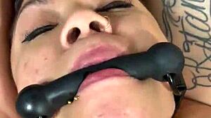 Gag in mouth boosts my squirting during interracial fingering and masturbation