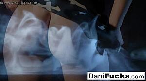 Gothic vampire Dani masturbates her big tits and pussy.