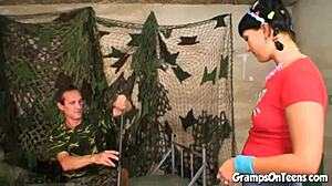 In the military base, a naive teen eagerly rides the old officer's cock in reverse cowgirl position