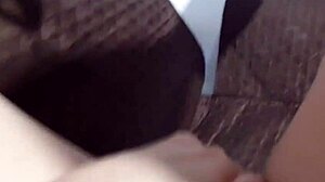 Latina masturbates on wet sofa.