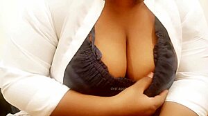 Asian aunty with big boobs and sexy tits relaxes.