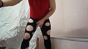 A travesti explores toys with a dildo in this narrative