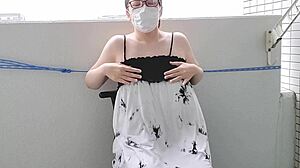 Wife Masturbates Boldly on Balcony