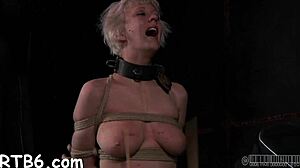 Bound woman dominates with rough oral in BDSM