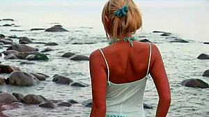 Masha, that pretty tanned amateur with big tits, slowly takes it off in this sexy promo