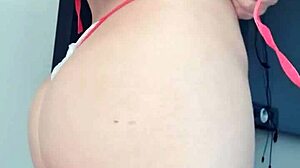 Blonde slut flashes her big ass and tits in a towel at the window!