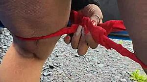 Are you watching me suck my master's piss on the highway while flashing passing cars?