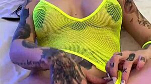 sexy tattooed hottie rides in lingerie