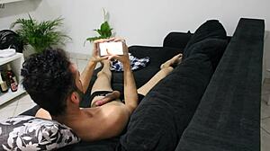 handjob session while watching hot twink porn