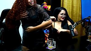 Emy tattooed brazilian flaunts big tits and ass in sheer outfit during dirty talk podcast.