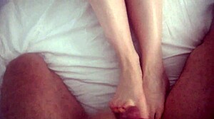 a czech european woman gives a home footjob to her lover in an intimate setting