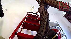 Cleaner maid tidies office without panties.