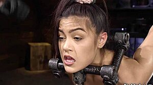 hot ass babe bound tight and spanked hard in device bondage?