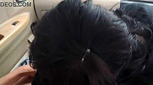 Asian Couple Enjoys Homemade Massage in Car