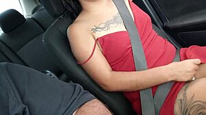 Tattooed Latina wife boldly flashes her huge tits on a public road, teasing voyeurs with her horny exhibitionism