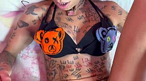 Tattooed Babe Blows Young Guy By Pool