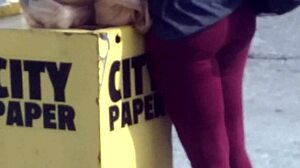 Single black woman feels relief catching the bus after shopping