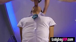 Flat chested asian ladyboy chick performs in her uniform.