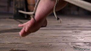 Goth babe says, Suffering in hogtie suspension bondage.