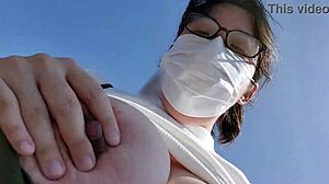 a desperate bride with big tits rubs herself openly in a parking lot.