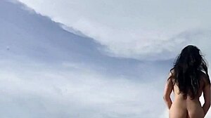 damn, look at this sexy hot ladyboy stroking her monster cock on a white sand beach!