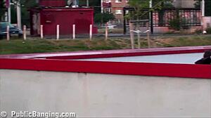 Cute teen girl takes on two guys in risky public threesome gangbang.