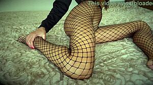 Slender beauty rides rubber dick