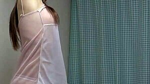 Busty Japanese Girl Dances Seductively in See-Through Lingerie, Revealing Her Bubble Butt