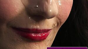 Lingeried beauty takes a massive facial load after intense close-up action.