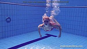 proklova takes off her bikini and swims nude under water at the pool