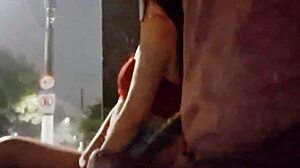 Brunette risks public masturbation at bus stop