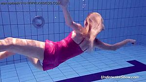 proklova takes off her bikini and swims nude under water at the pool