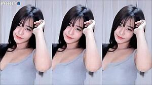 i'm watchin this koreen girl dancin and her big tits r bouncin out of her skirt, so sexy