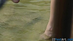 I watch this kinky footjob babe tuggin' my cock with her feet