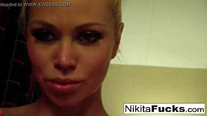 Hot milf Nikita solos in fishnets intensely