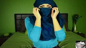 Sexy Arab hijabi shows off her big ass with hot twerking