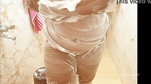 Bengali wife enjoys a relaxing bath