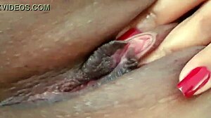 She touches her sweet pussy in a solo masturbation session.
