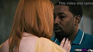 Lauren Philips engages in footsie play with Isiah Maxwell under the table