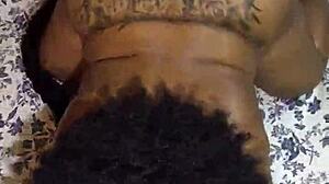 Ebony girl with shaking ass in the hood performs close-up scenes.