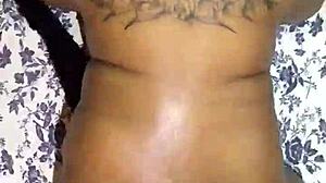 Ebony girl with shaking ass in the hood performs close-up scenes.