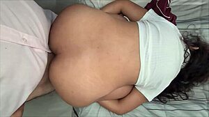 College girl visits her teachers office for a chat