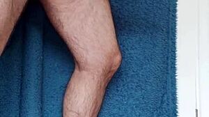 Gay tattooed guy wanks cock in kitchen