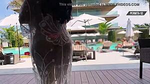 I'm showing off in my micro bikini at the hotel pool, looking for a threesome